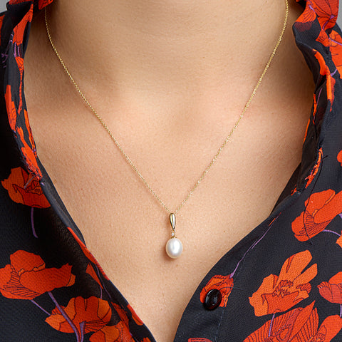 14 Karaat Geelgouden hanger met Parel 8.5 x 14 mm en Zirkonia